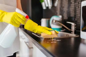 cleaning the kitchen